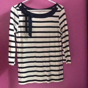 Three quarter length striped shirt.